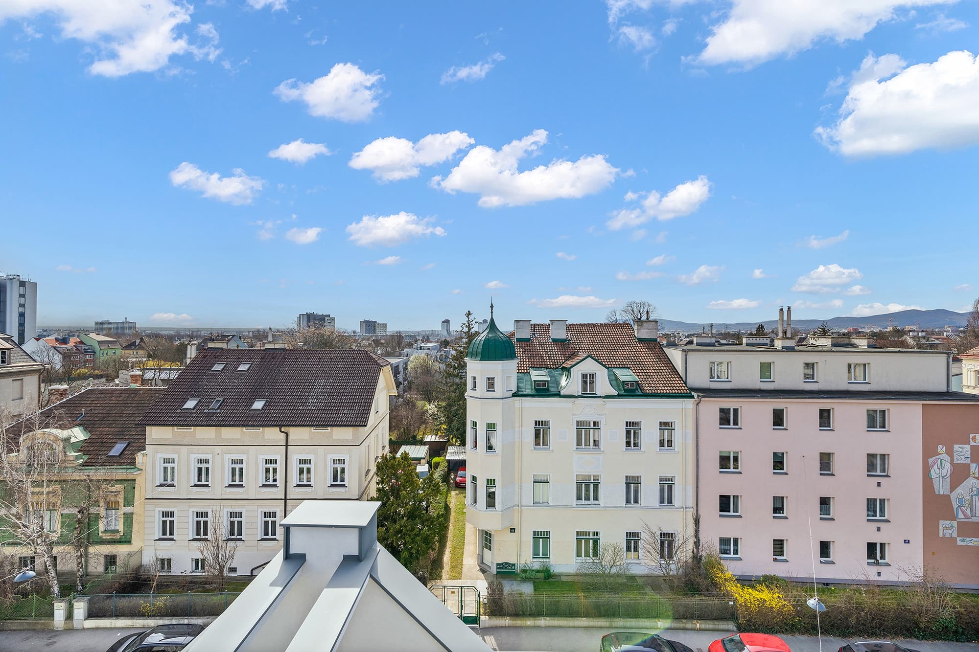 Modern top-floor apartment with large roof terrace